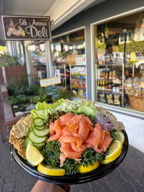 Smoked salmon and lox platter with cream cheese, capers, and fresh lemon
